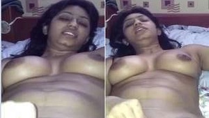 A horny Desi Wife is going with a pink dildo