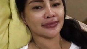 Indonesian milf with dark nipple fashionably absorbs