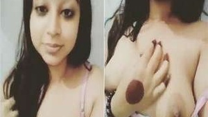 Hot look Desi Girl showing her breasts and pussy