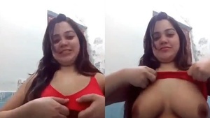 Beautiful busty girl exposes her big tits