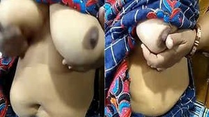 A horny Desi Bhabhi Pali with her big tits and jerking off