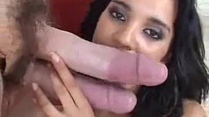 A guy surrounding 2 roosters