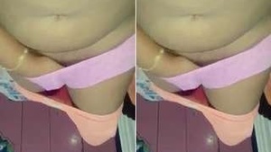 A horny Desi Bhabhi controls her pussy