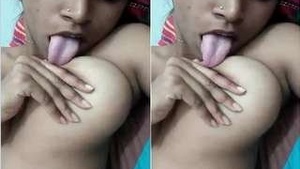 Pretty Girl Sucking Her Tits