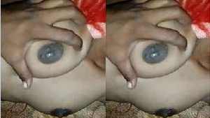 Desi Bhabhi Presses Her Breasts