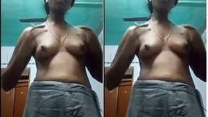 Tamil Bhabhi Presses Her Tits