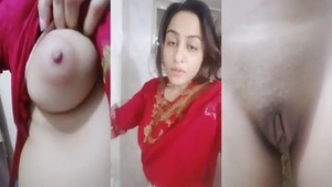 Horny Pakistani woman showing off her round tits with nipples