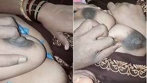 Exclusive Desi Hillbilly Bhabhi, cradling her Husband's breasts