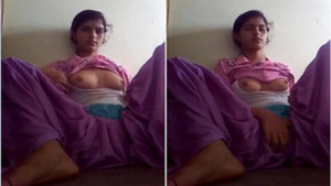 Horny Indian teen masturbate without taking off a purple outfit