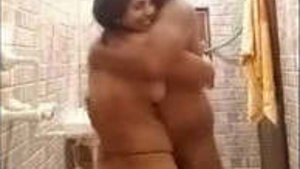 Desi couple enjoys a steamy bathroom blowjob