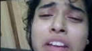 Beautiful Teenager Moans as She Inserts a Lollipop Stick into Her Butt and Pussy