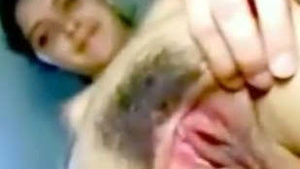 Hairy pussy hole gets a deep-throat blowjob in close-up view