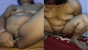 Desi bhabhi pleasures herself with brinjal in Exclusive porn video