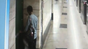 A young couple indulges in a steamy oral session in a subway station