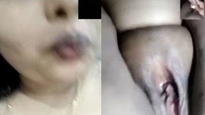 A Sexy Bhabhi Teases with Her Breasts and Genitalia