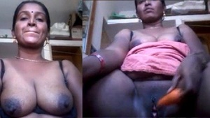 Indian aunt with a wet pussy enjoys vegetables in solo play