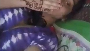 Rubbing her wet pussy