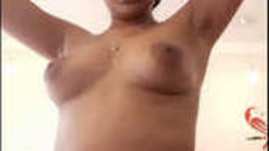 Aroused woman pleasures herself with an ohmibod vibrator in her pussy