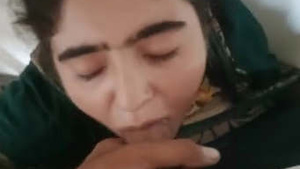 A stunning Pakistani woman enjoys taking cum in her mouth