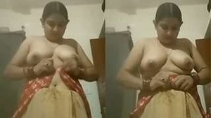 Desi Wifes Sensual Display of Her Large Breasts