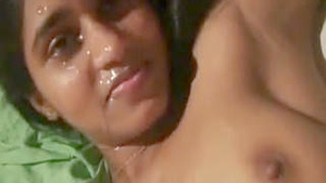 Desi Indian girl gets a facial cumshot after taking it