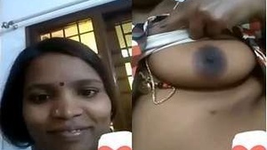 Exclusive Video Call with Tamil Bhabhi Showing Off Her Boobs and Pussy