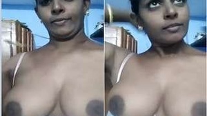 Desi Bhabhi Shows Off Her Big Tits in a Steamy Video