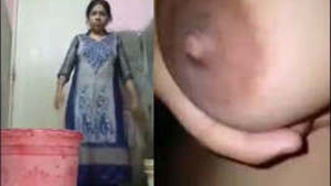 Bhabhi in the bathroom showering and showing her big tits