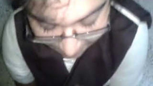 Sexy college girl in glasses gives a hot blowjob