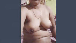 Desi Bhabhi Teases and Reveals Her Big Breasts and Tight Pussy