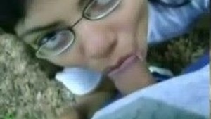 Indian beauty gives her lover a sensual blowjob in the park