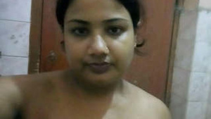 Bathroom selfies of a cute aunt with big breasts