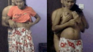 Desi Belle shows off her boobs and squeezes for money