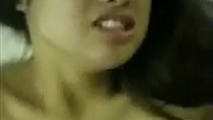 Desi bhabhi moans loudly as she engages in rough home sex with her neighbor