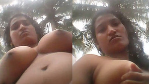 Desi auntie flaunts her luscious breasts in front of the camera