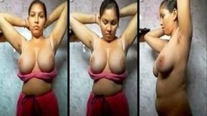 Desi girl with huge natural boobs strips down in the bathroom