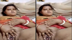Indian Bhabhi Shows Off Her Big Boobs and Fingers Herself in Exclusive Porn Video