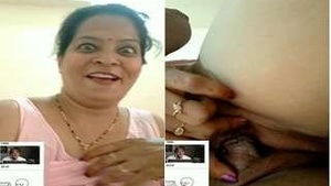 Desi babe flaunts her big boobs and pussy in a steamy video call