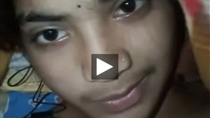 Desi Indian girl pleasures herself with her fingers in 415 video