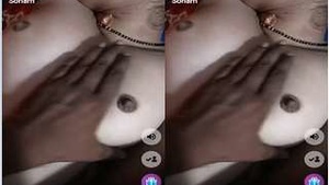 Exclusive Hot Video: Bhabhi Masturbates with a Huge Dildo and Presses Her Breasts