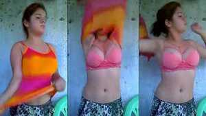 Newcomer college girl gets naughty in stripping video