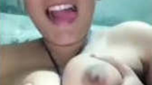 Horny Punjabi girl playing with her breasts and fingering pussy