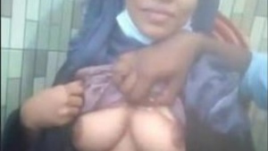 Hijabi girl with huge tits sucked by lover in restaurant