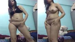 Desi teen takes her T shirt and pants down baring XXX body and dancing
