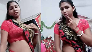Chubby housewife Rakhi shows off her chubby belly in hot dance