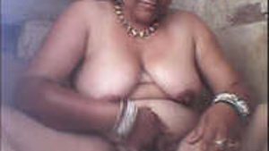 Older woman enjoys a bath with her villager