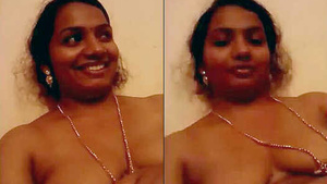 South Indian wife flaunts her nude breasts and pussy in a steamy video