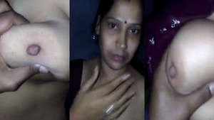 Mature aunt indulges in sensual touch on her roommates breasts