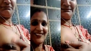 Desi Bhabhi flaunts her ample breasts in this video