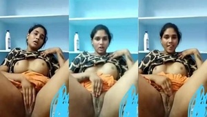 Desi girl flaunts her bare breasts and pussy in this steamy video